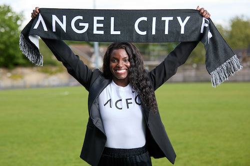 Eniola Aluko holding Angel City scarf